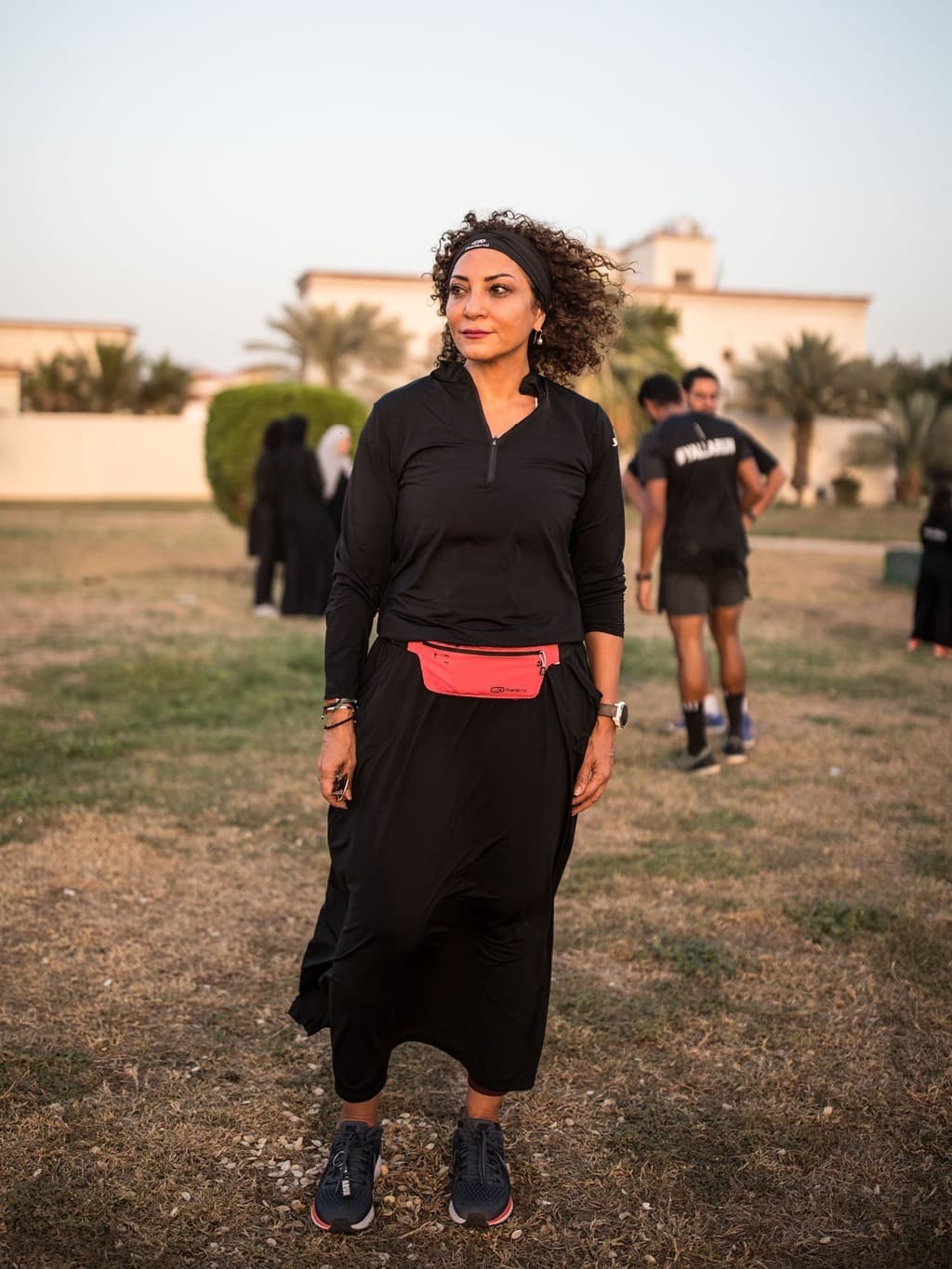 نسرين غنيم في الصورة مرتدية اللباس الرياضي.