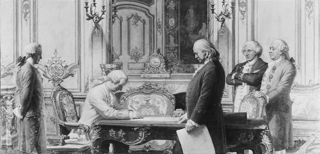 ها هو مؤلف ”أطلق الريح بفخر“ (بنجامين فرانكلن) وهو يساعد على توقيع معاهدة الحلف بين فرنسا والولايات المتحدة الأمريكية.