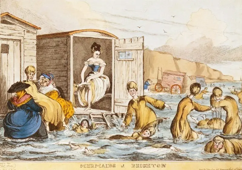 لوحة بعنوان حوريات البحر على شاطئ برايتون Mermaids at Brighton والتي رسم فيها William Heath مجموعةً من السيدات اللواتي يسبحن مع آلات السباحة على شاطئ برايتون في عام 1829